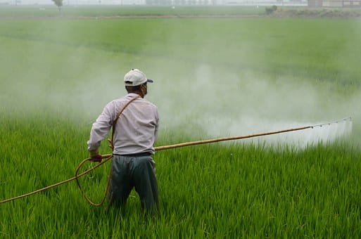 pic of spreading pesticides