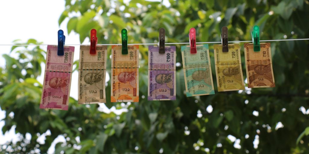 who benefits from rupee fall